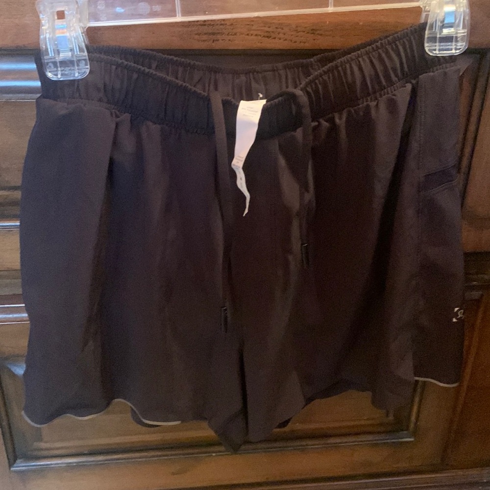 - Lululemon Men’s Run Surge 3” Black running shorts with liner.